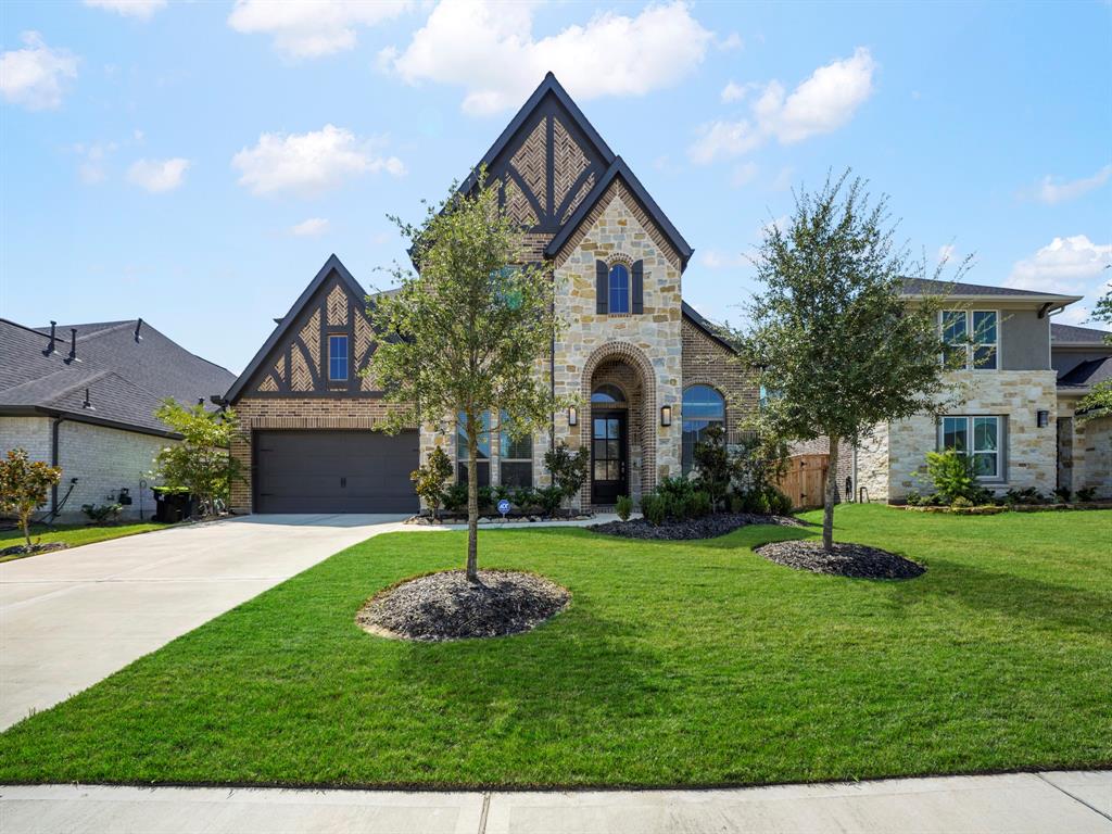 Welcome home! Beautiful Perry home is only 2 years old with tons to offer. Home has over 3600 Sq ft with 4 bedrooms, 4 1/2 bathrooms, 3 car garage, study, game room, and media! Stunning curb appeal with brick and stone exterior accented with rich wood details and lush landscaping!