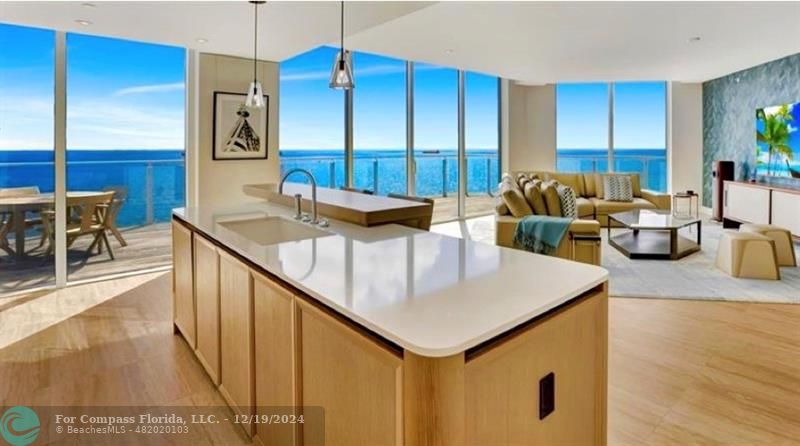 a very nice looking kitchen with a large window