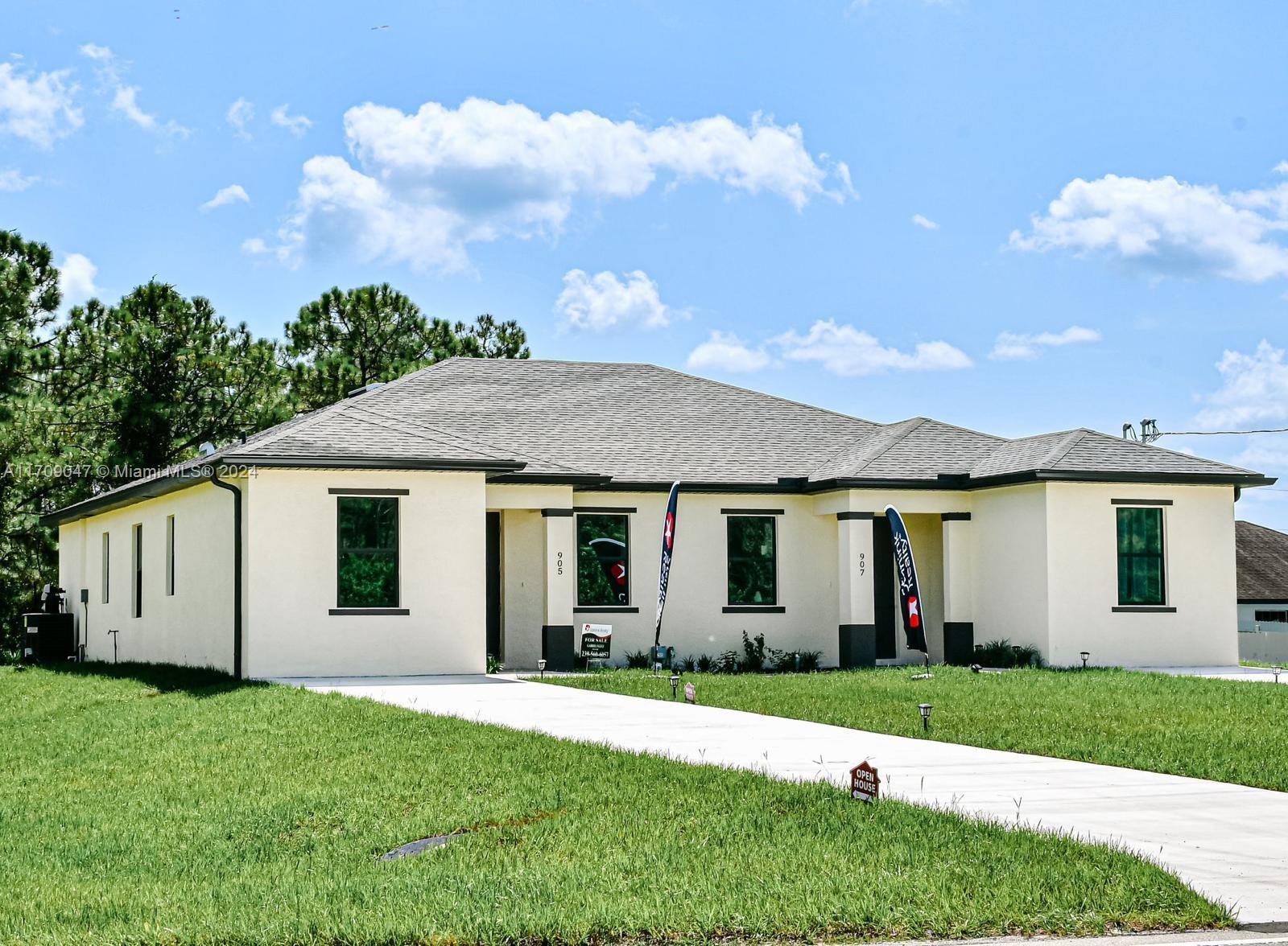 front view of house with a yard