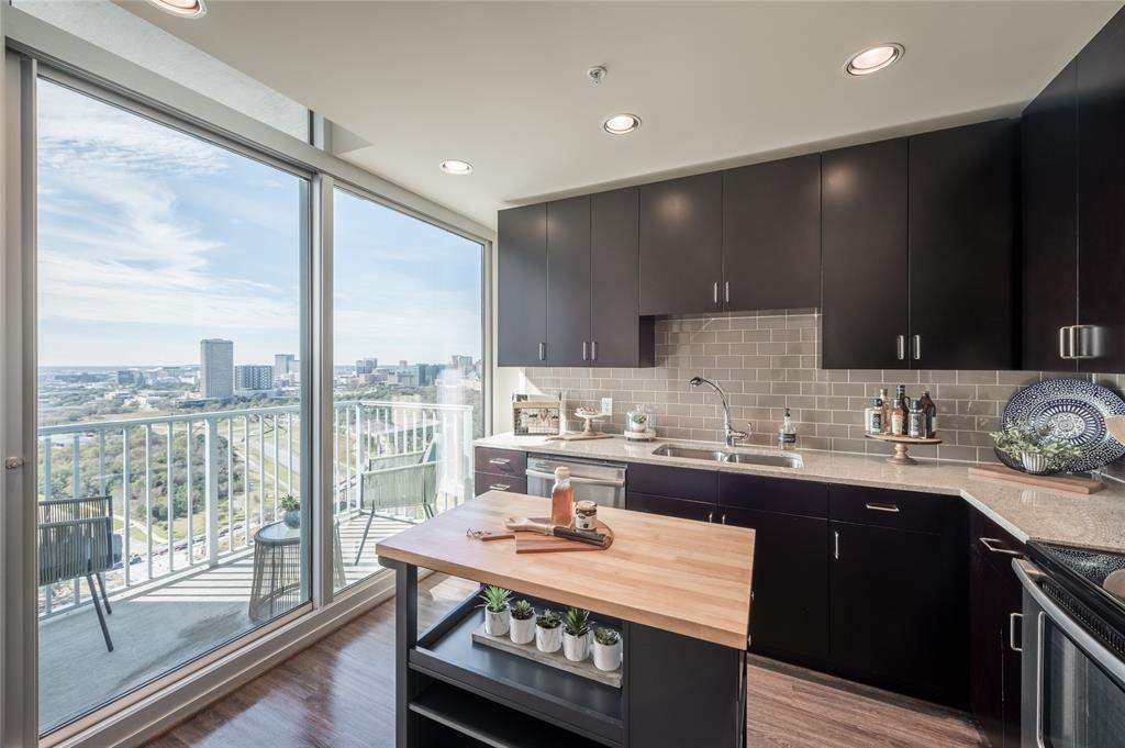 Welcome to the pinnacle of modern loft living in the vibrant Medical Center district, where urban chic meets panoramic elegance.