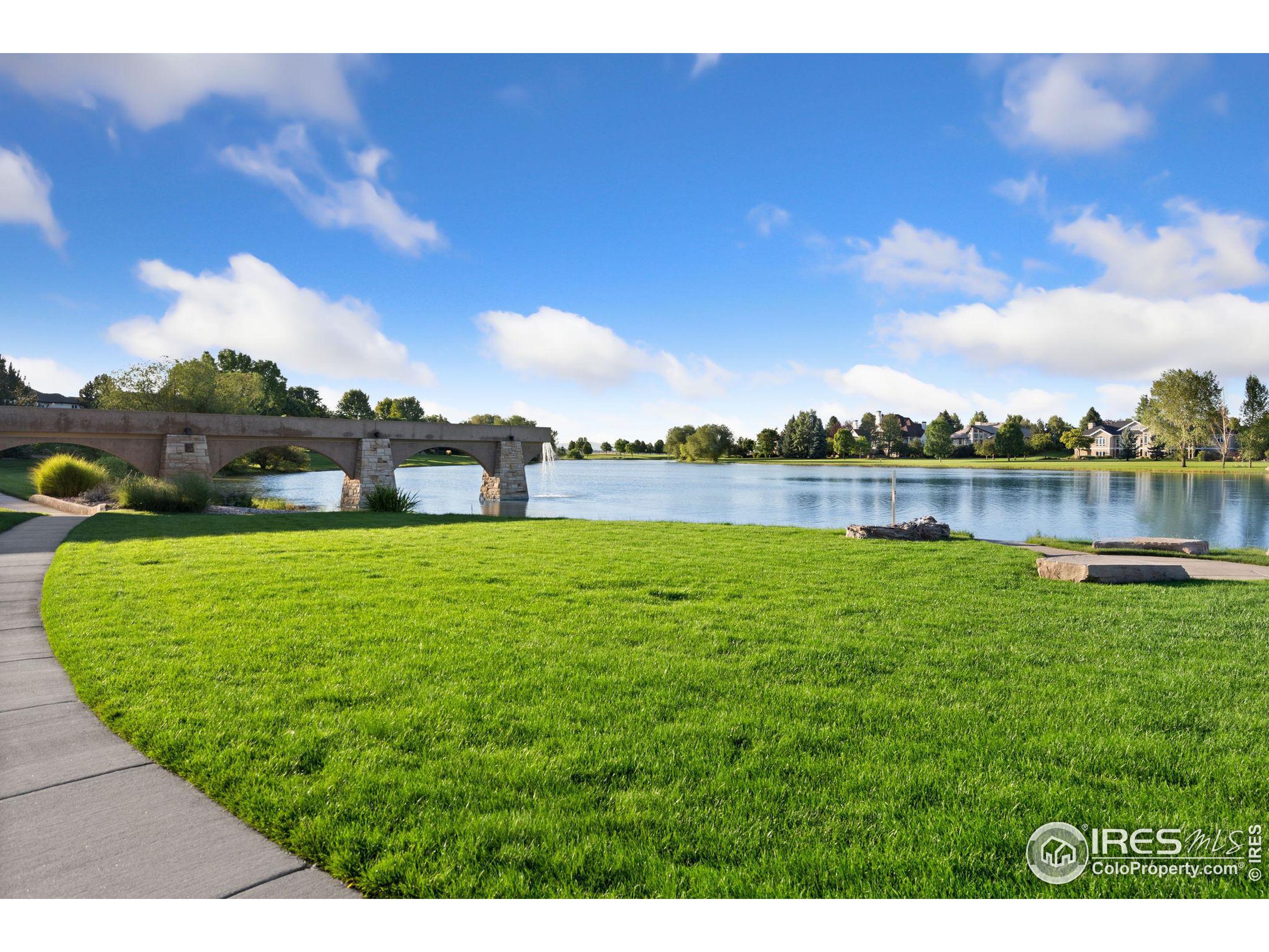 a view of a lake with a big yard