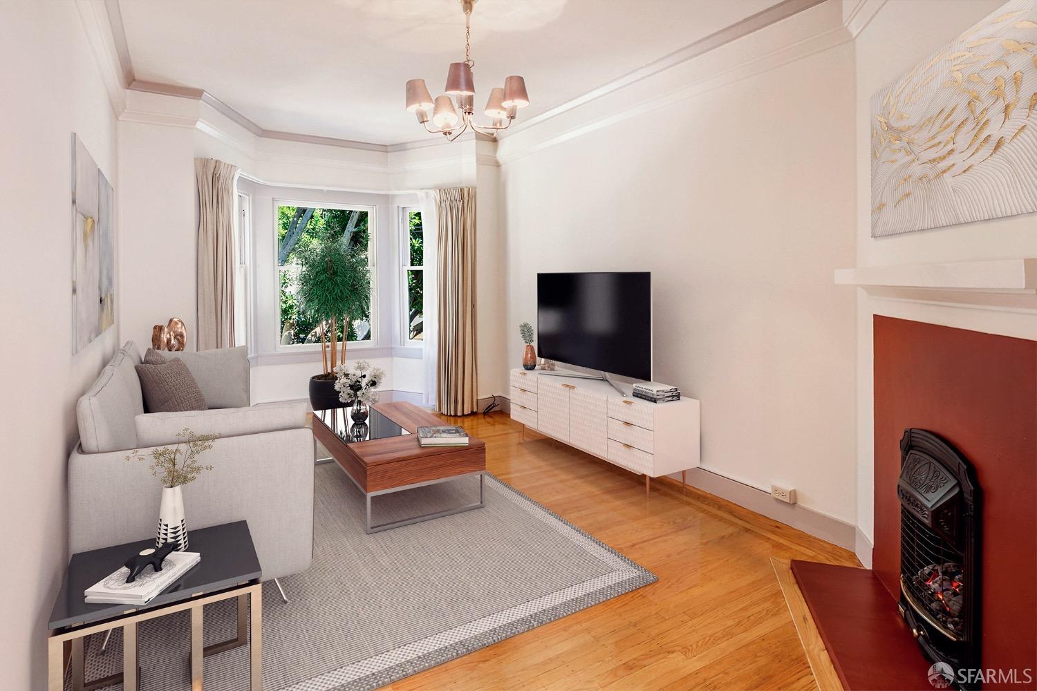 a living room with furniture and a flat screen tv