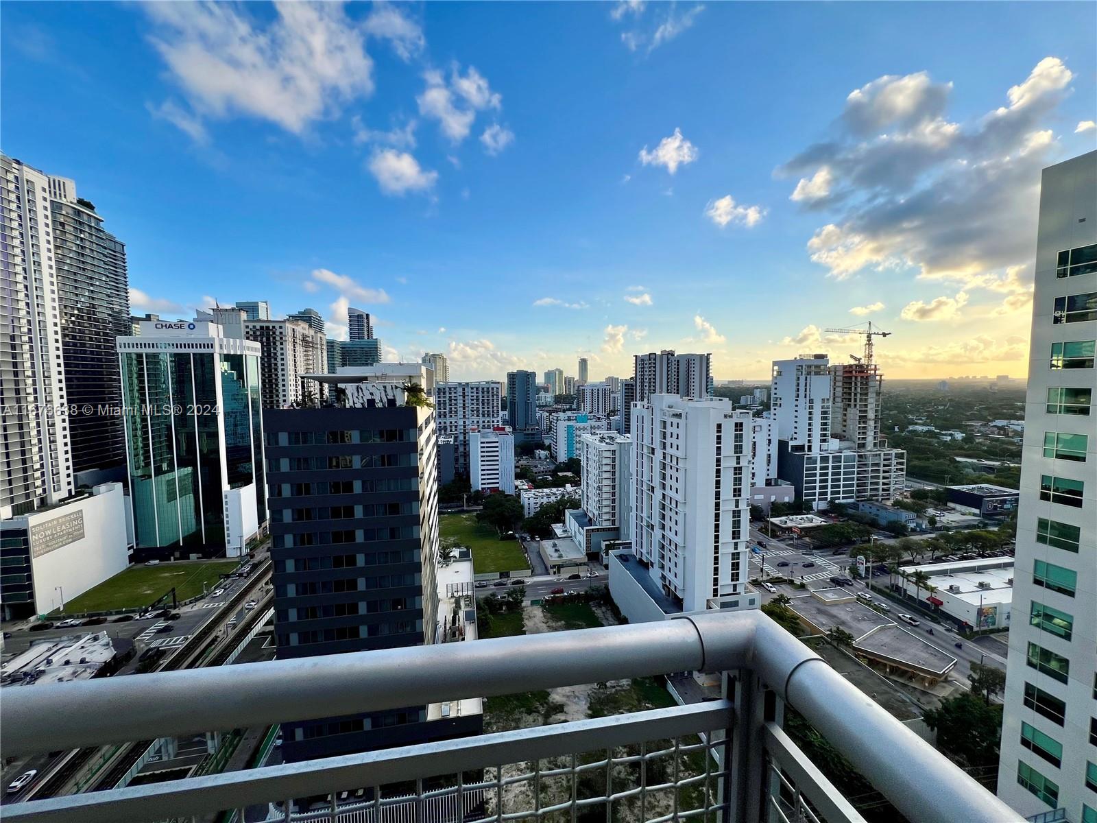 a view of a city view from a balcony