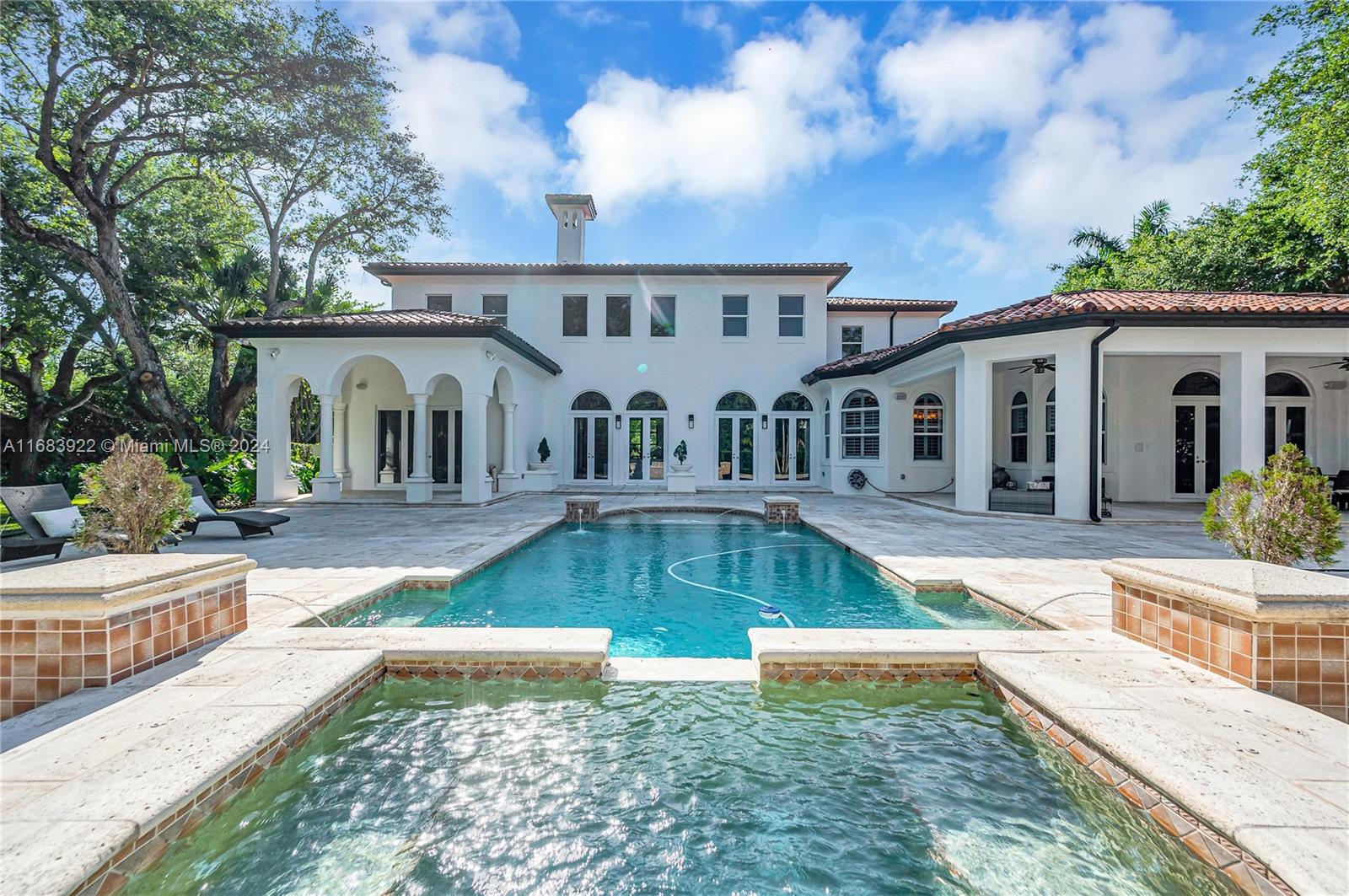 a view of a house with swimming pool