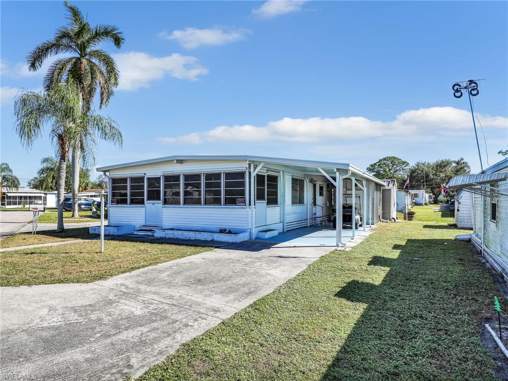 a view of a house with a swimming pool