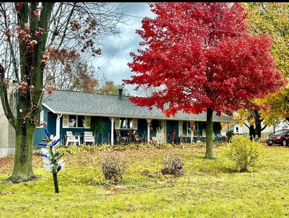 a front view of a house with swimming pool