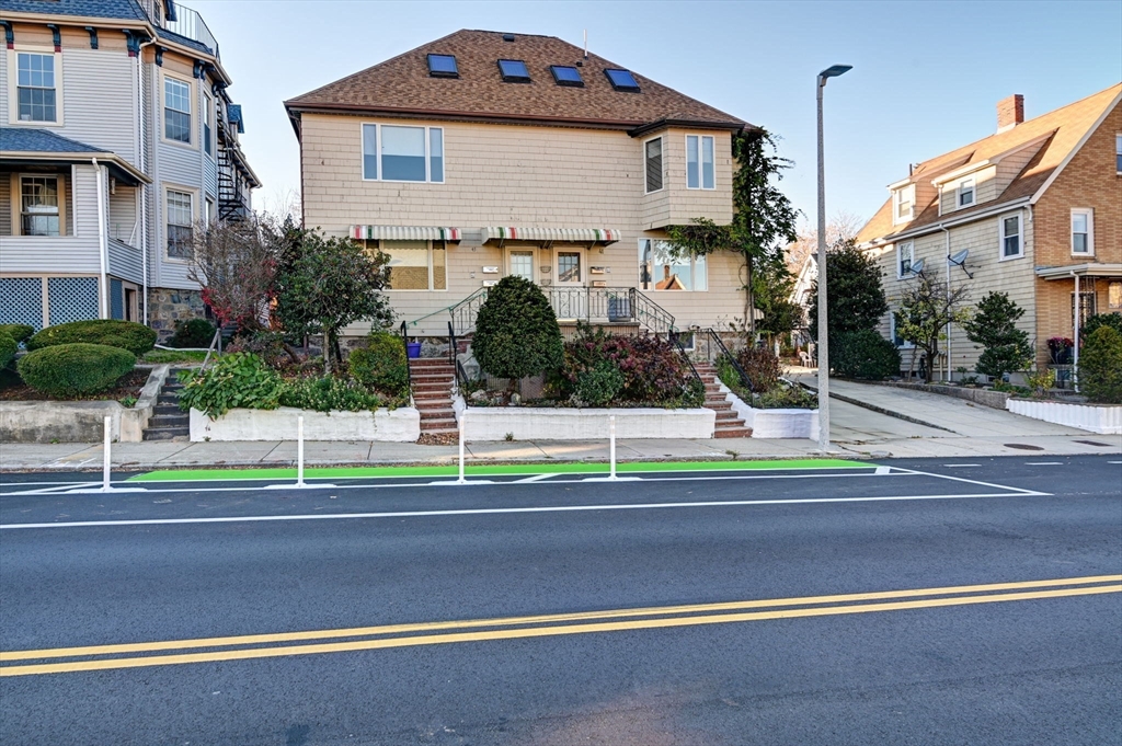 a house view with a street