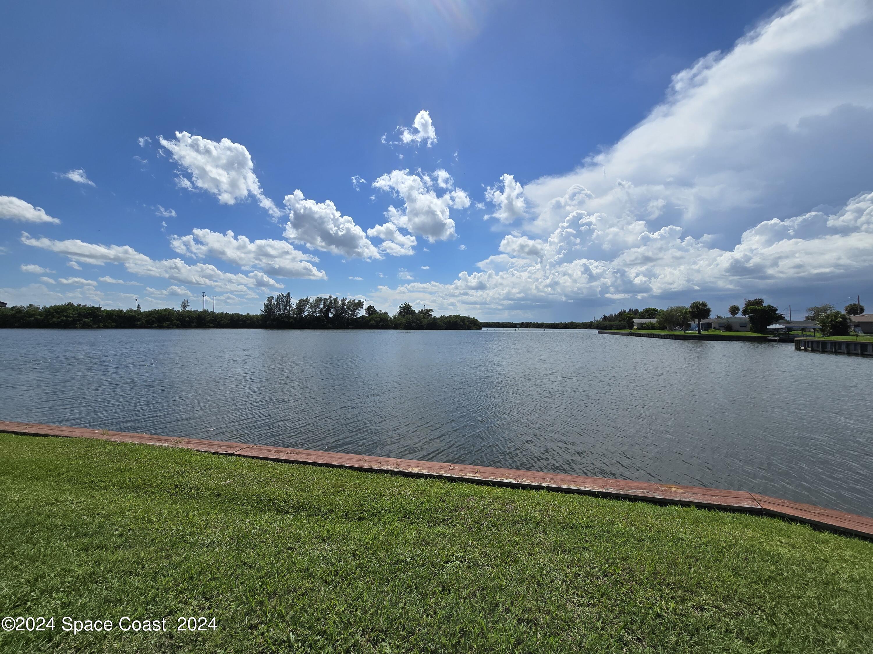 a view of a lake from a yard