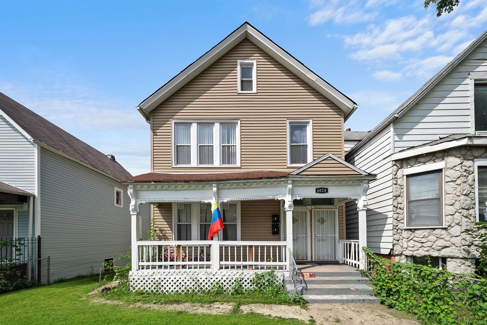 a front view of a house with a yard