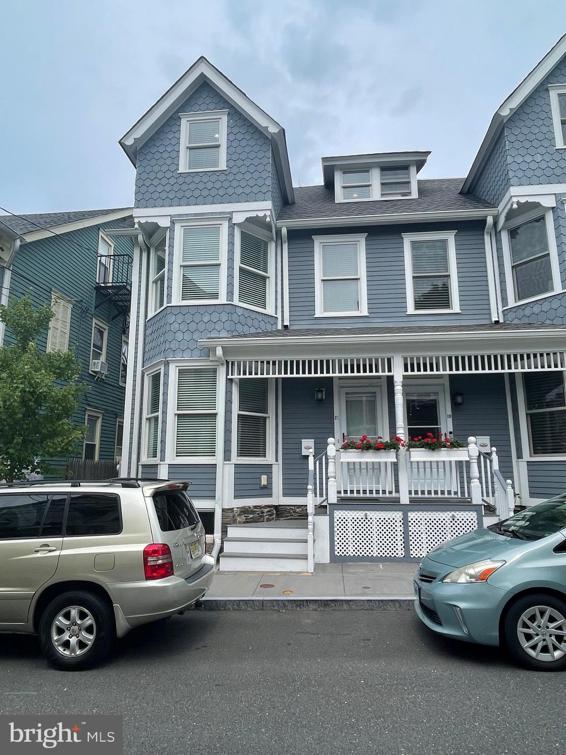 a car parked in front of a house