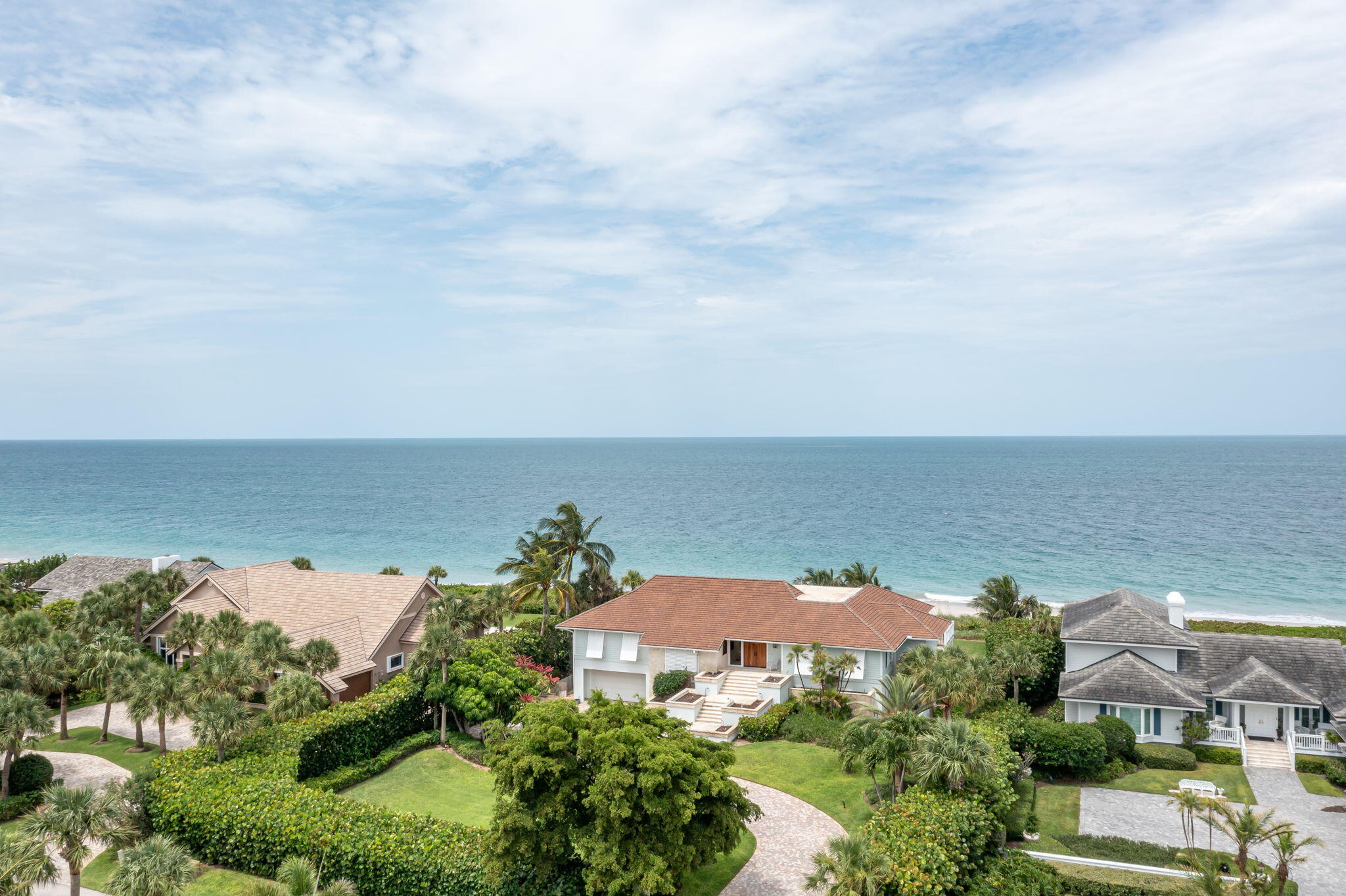 an aerial view of a house with a garden