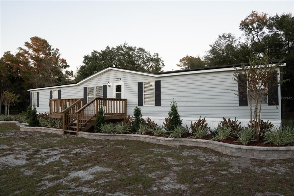 Welcome Home! Beautifully fully re-done home on 5 areas of land in quiet neighborhood less than 6 miles from everything.