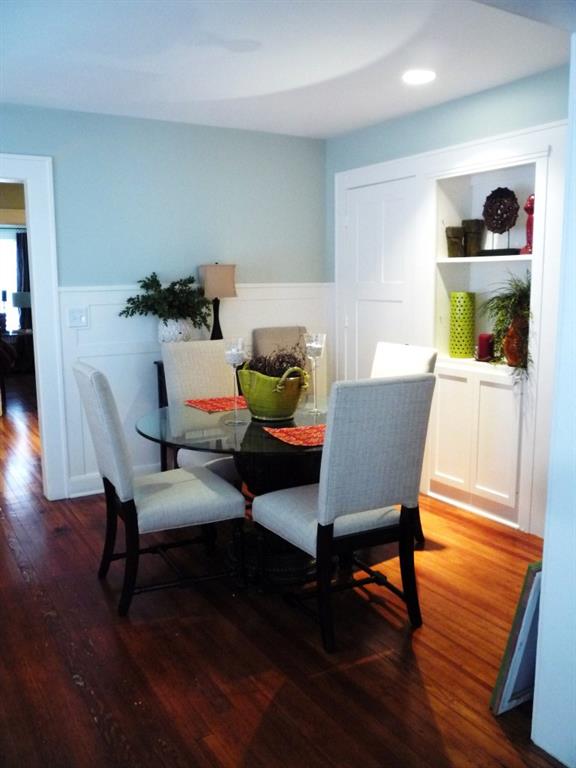 Dining room. Also works well as an office. Extra closets on both sides of shelves.