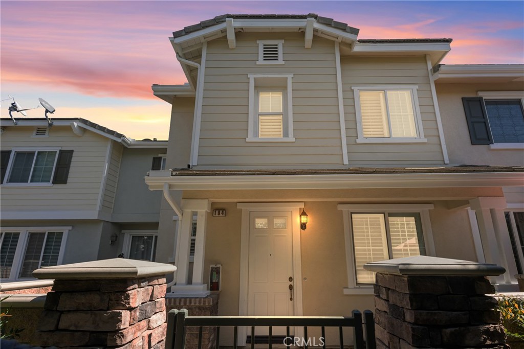 a front view of a house with a porch