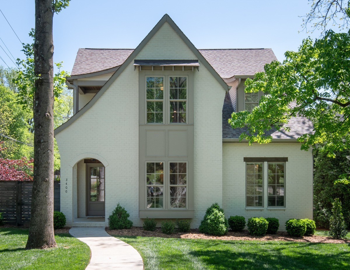 front view of a house with a yard