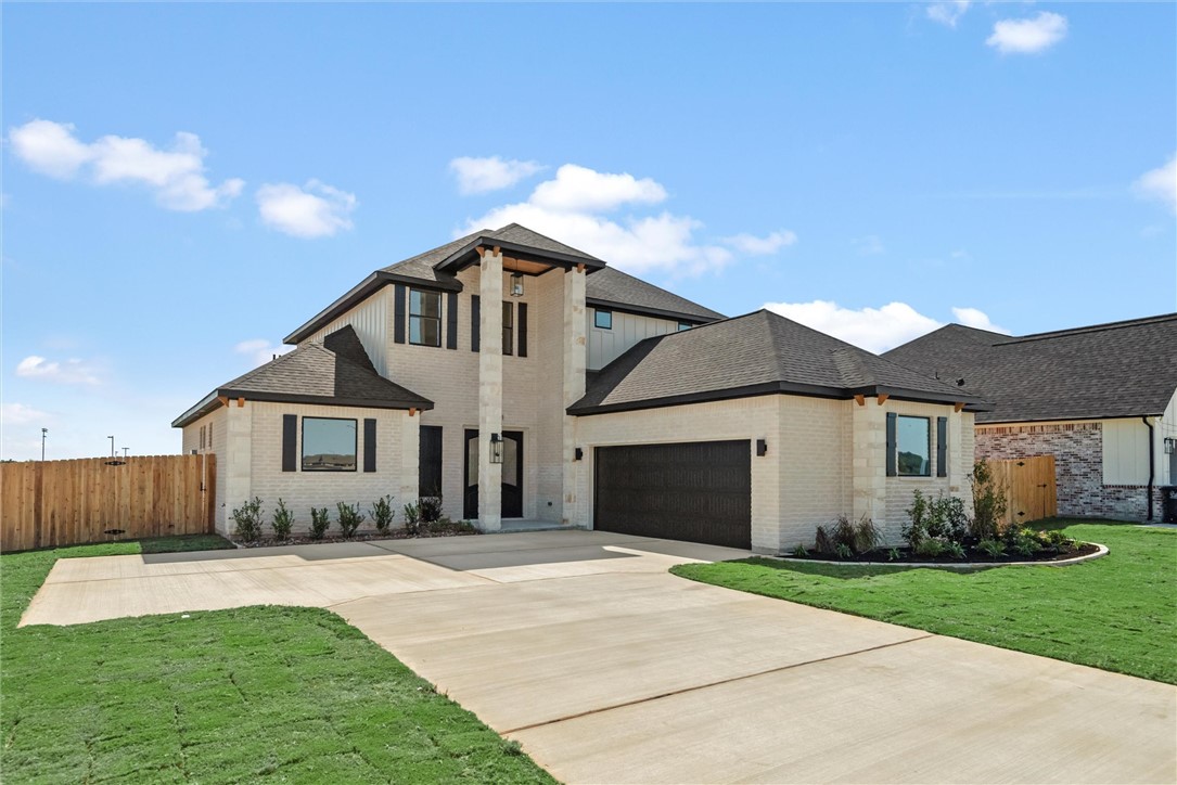 View of front of property featuring a front yard