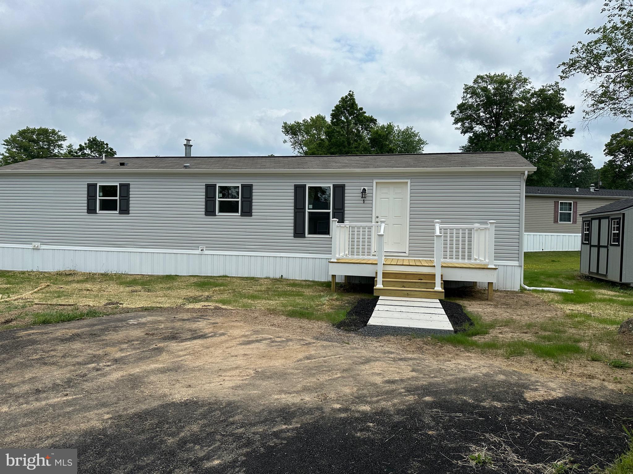 a view of house with outdoor space