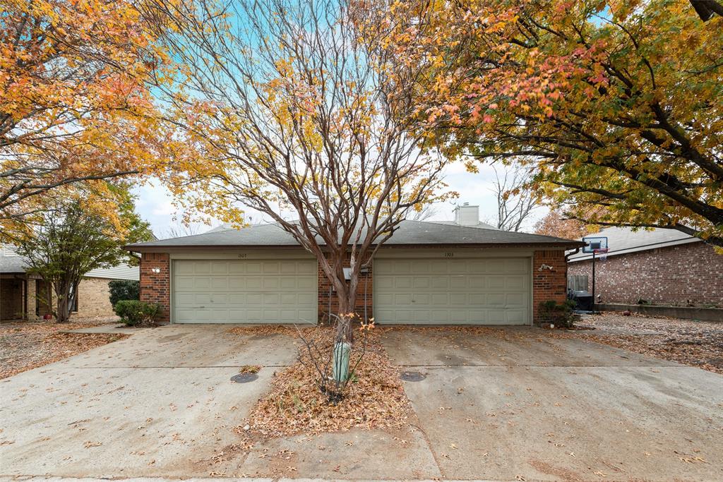 a front view of house with garage