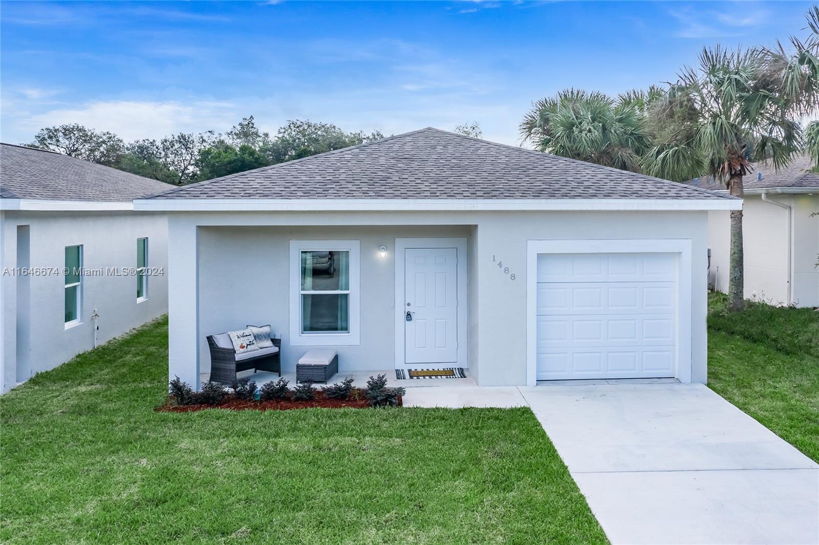 a front view of house with yard