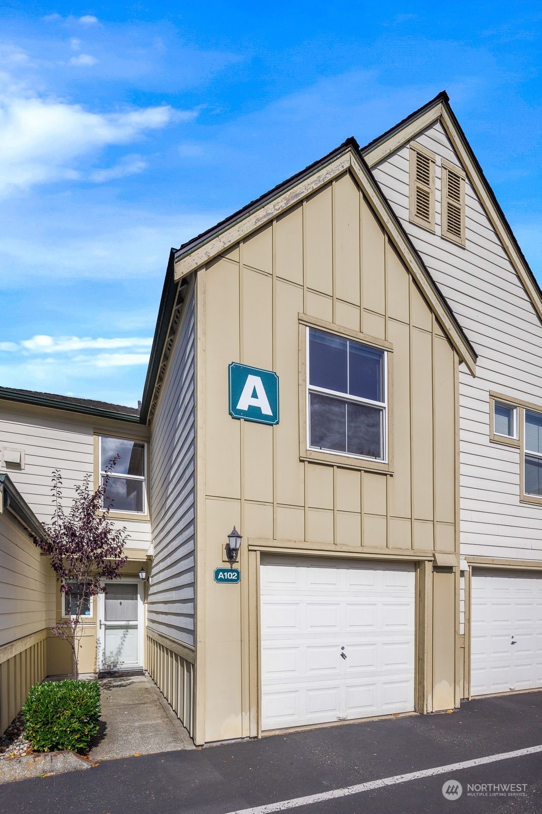 a view of a house with garage