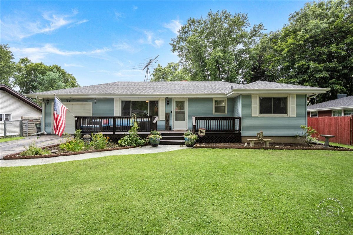 a view of a house with backyard porch and sitting area