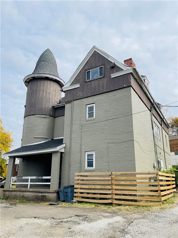 a front view of a house with a garage