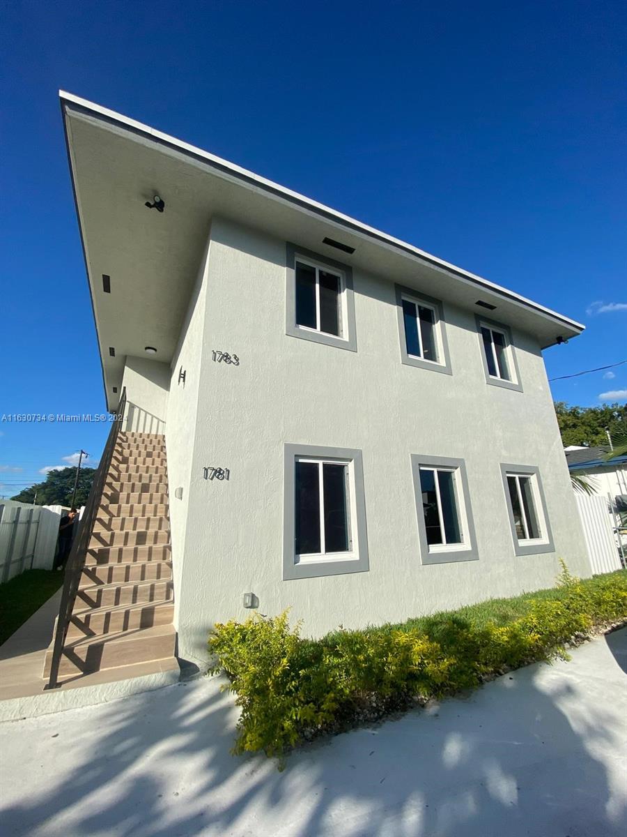 a front view of a house with windows