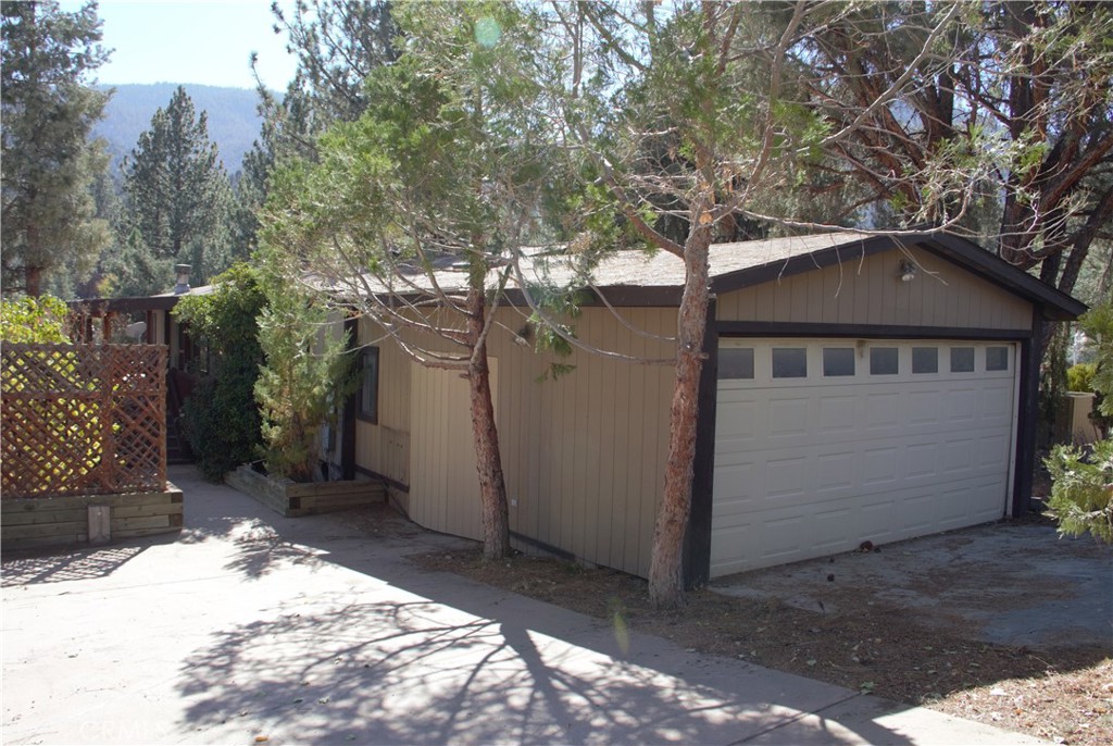 a house with trees in the background