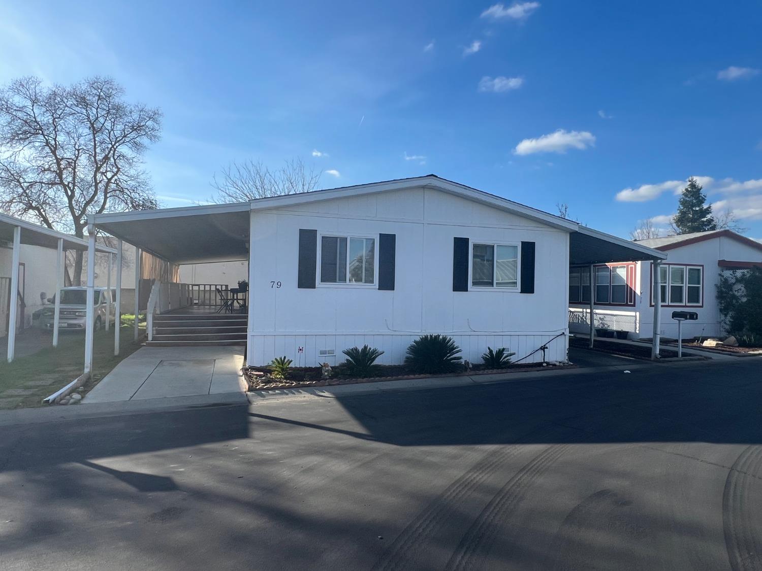 a front view of house with garage