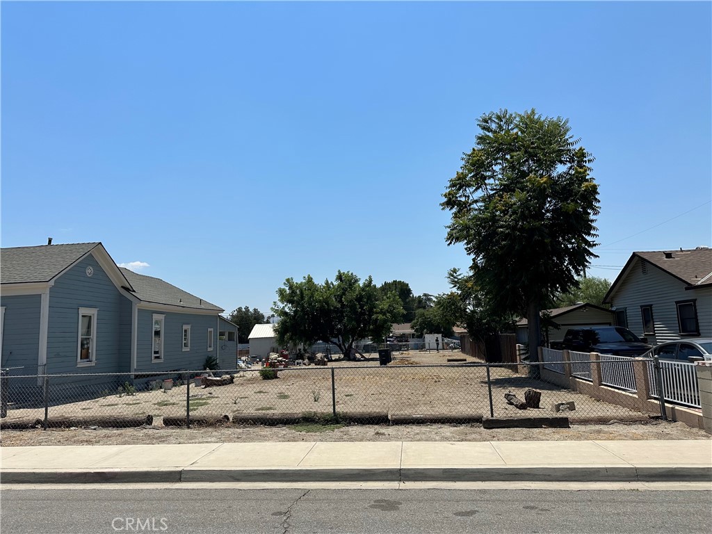 a view of a house with a street