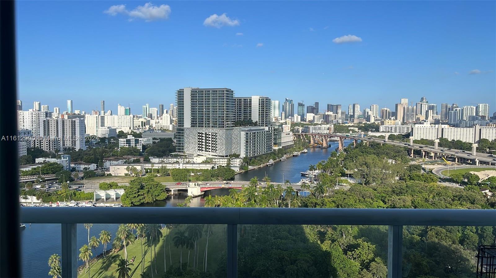 a view of a city from a balcony