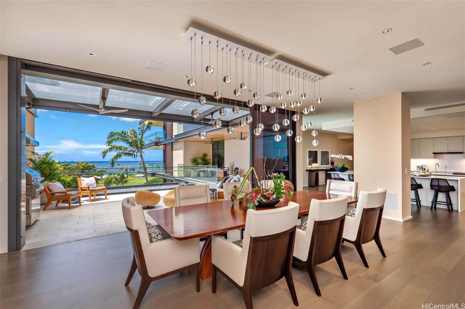 View from the formal dining room out to the lanai and stunning view.