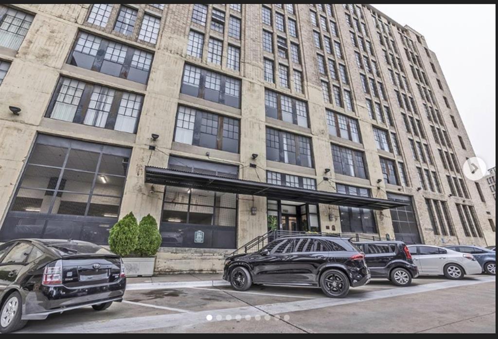 a car parked in front of a building