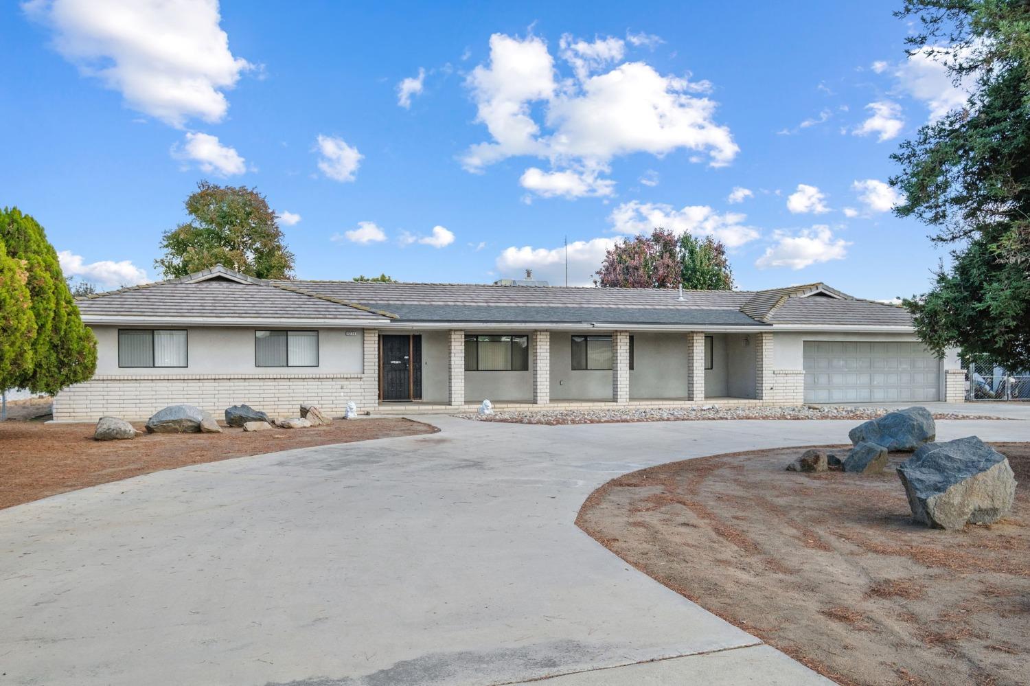 a front view of a house with entertaining space