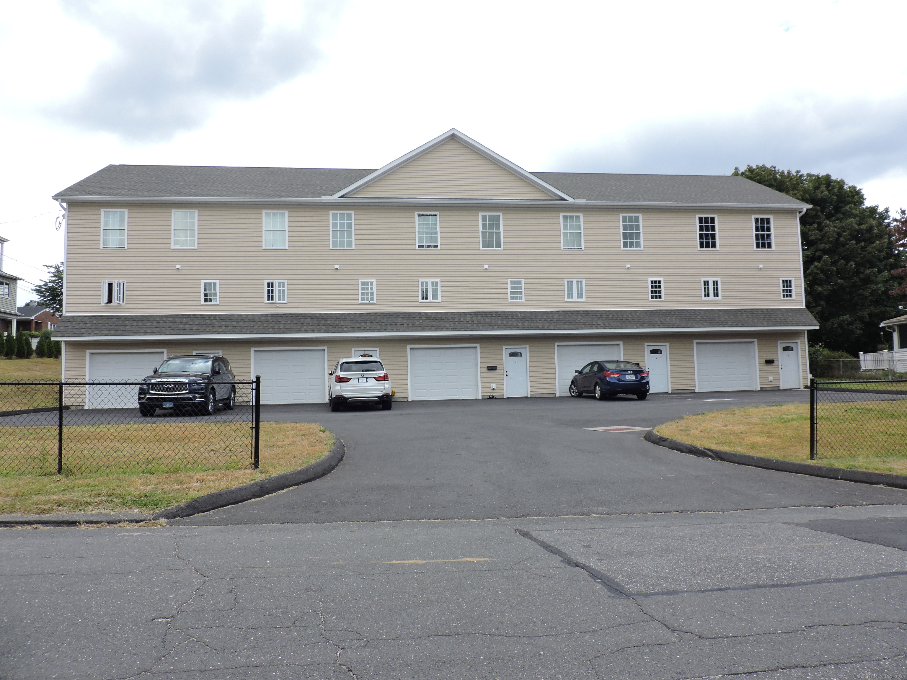 a large building with a sink and yard