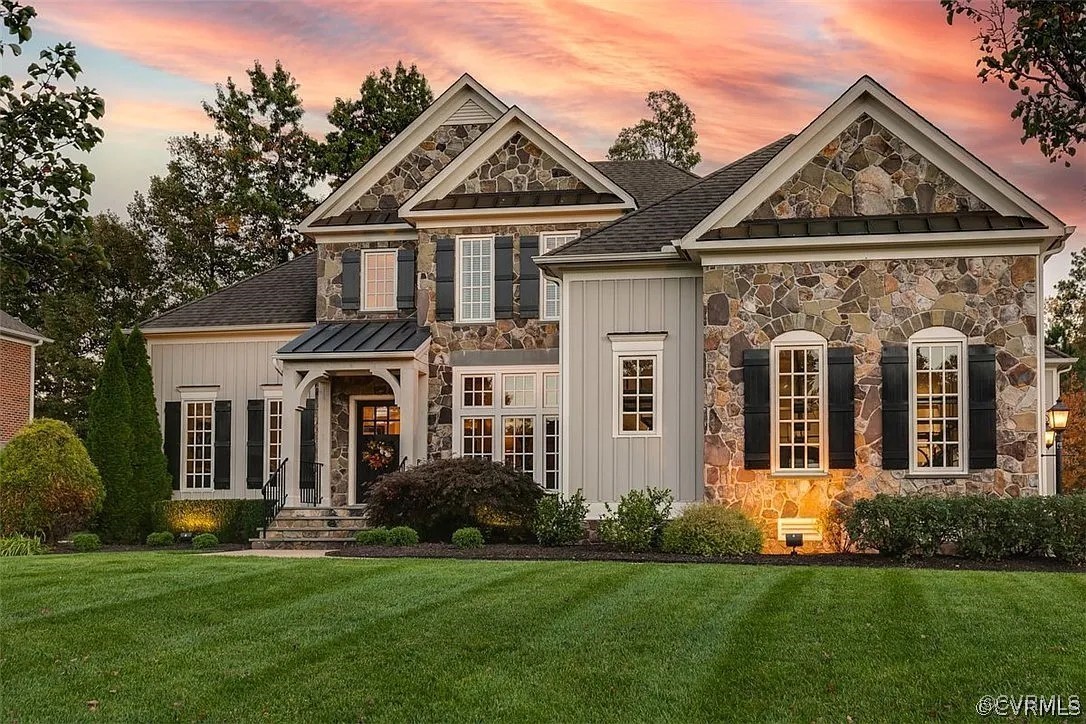 front view of a house with a yard