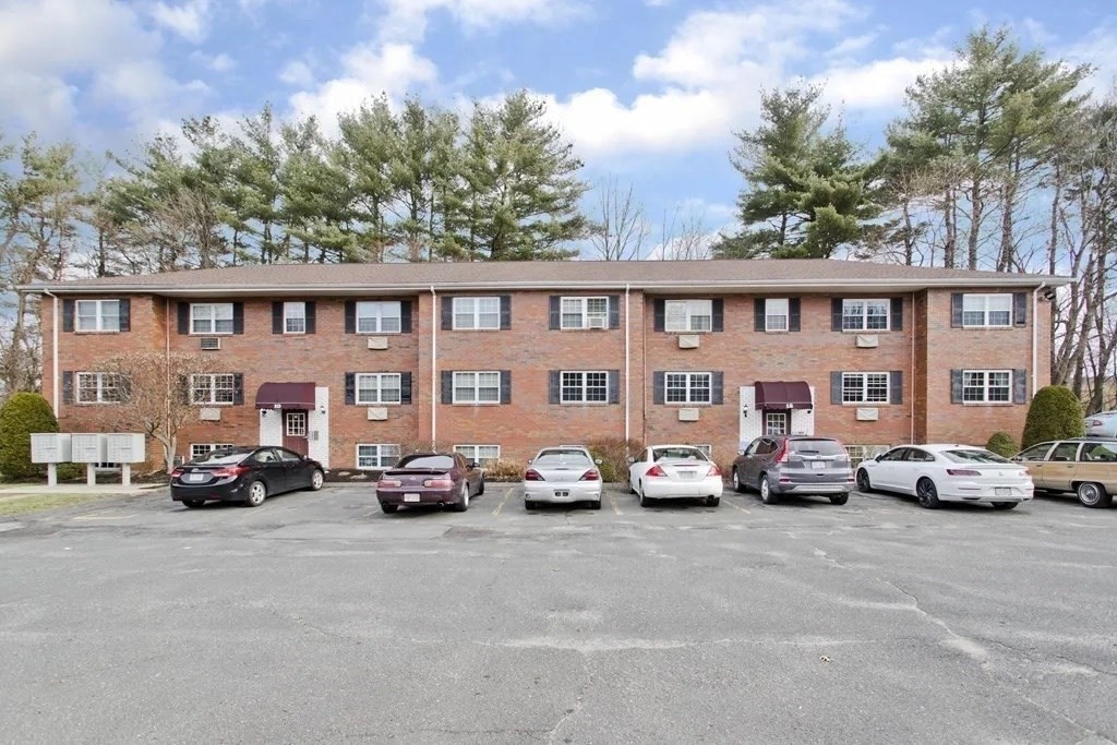 a cars parked in front of a building