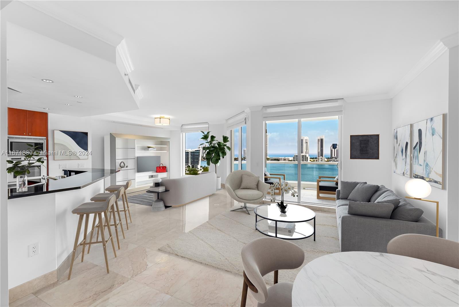 a living room with furniture and a view of kitchen