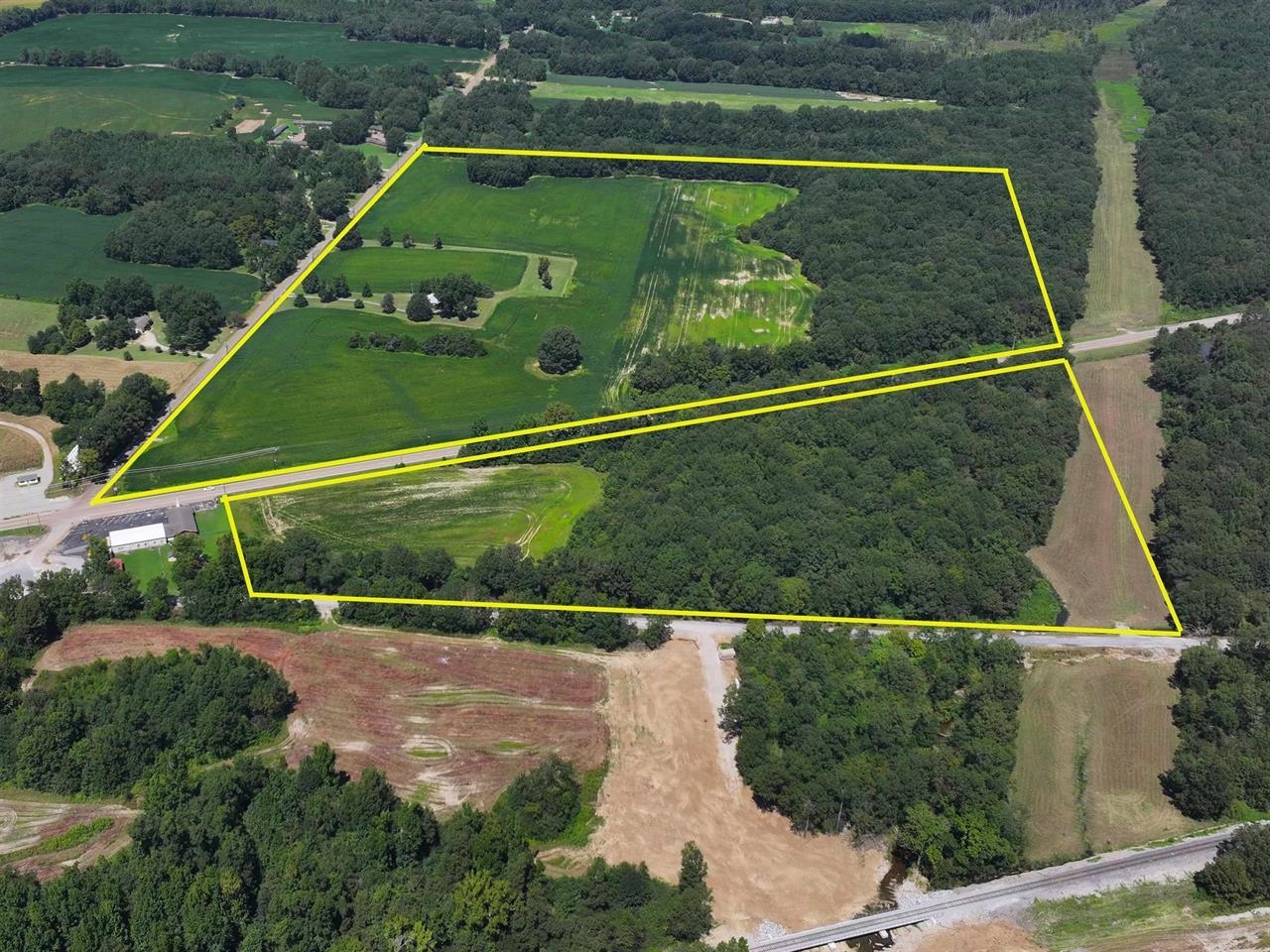 Birds eye view of property featuring a rural view