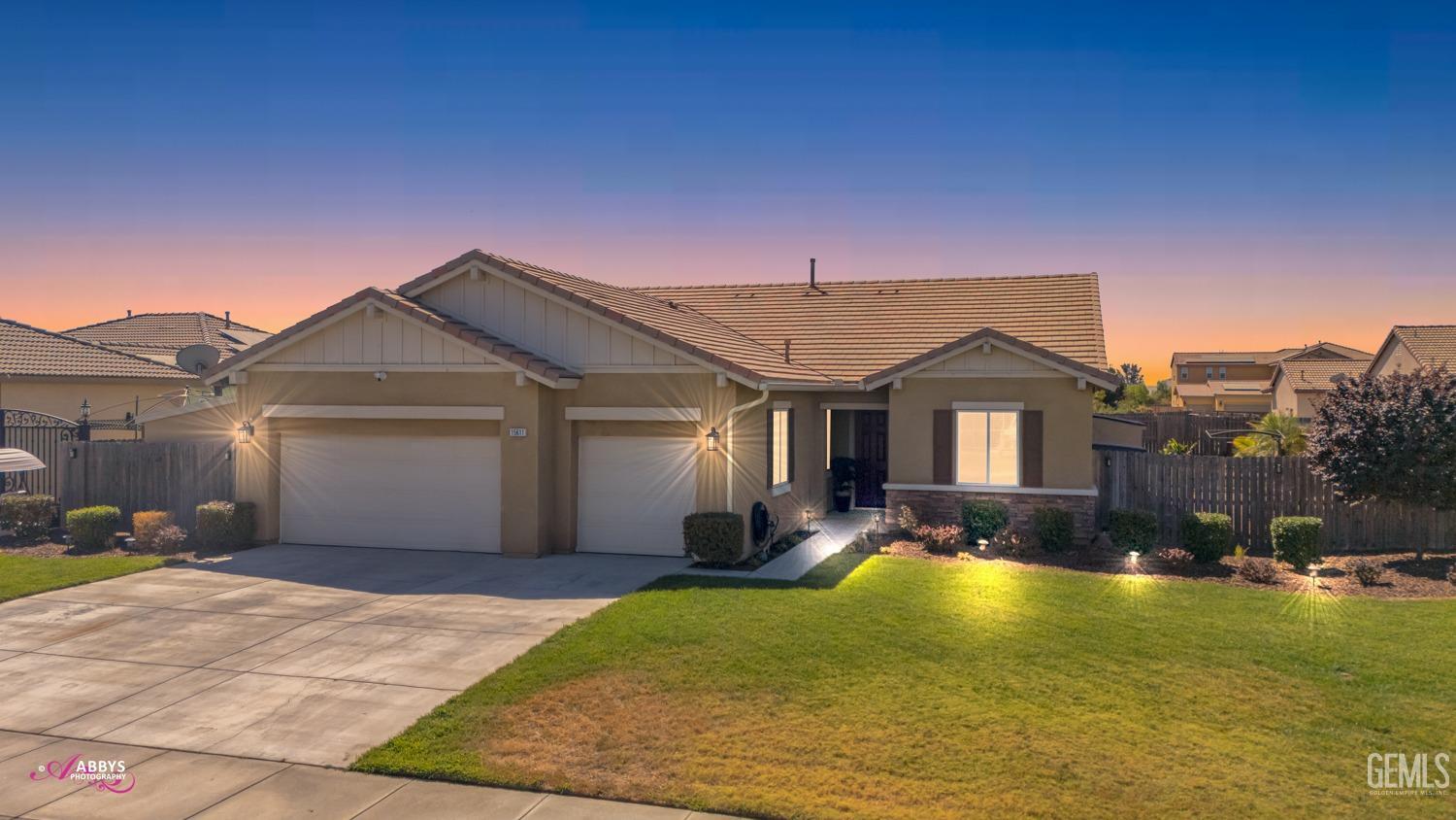 a front view of a house with swimming pool