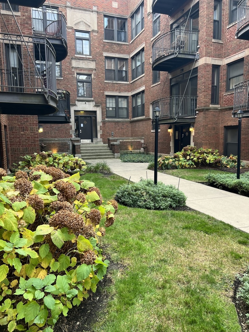 a house with garden in front of it