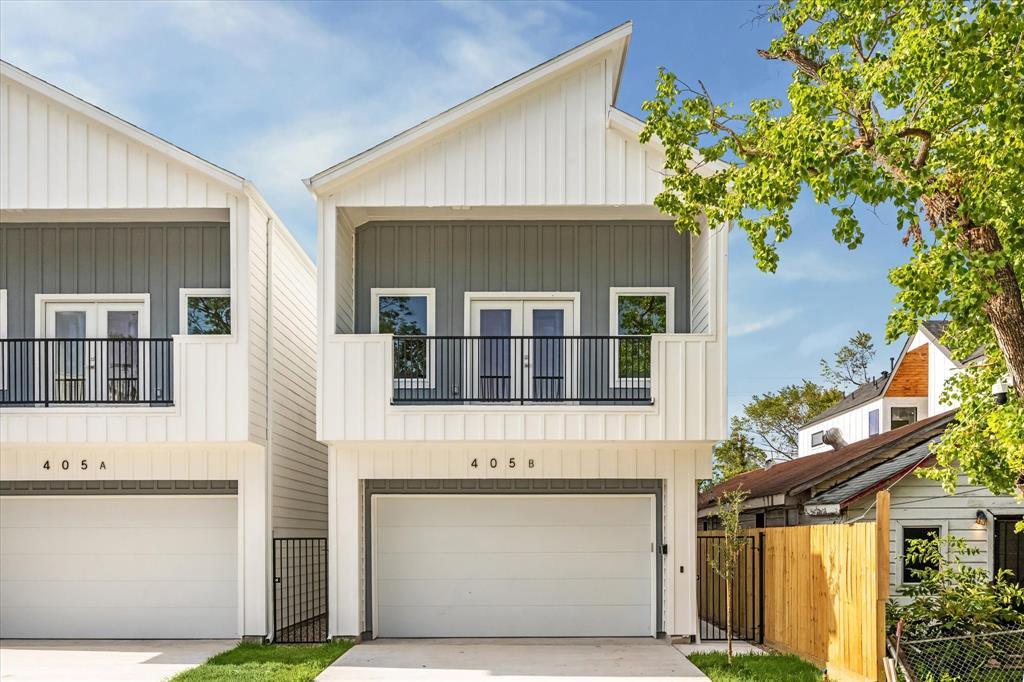 a front view of a house with a garage