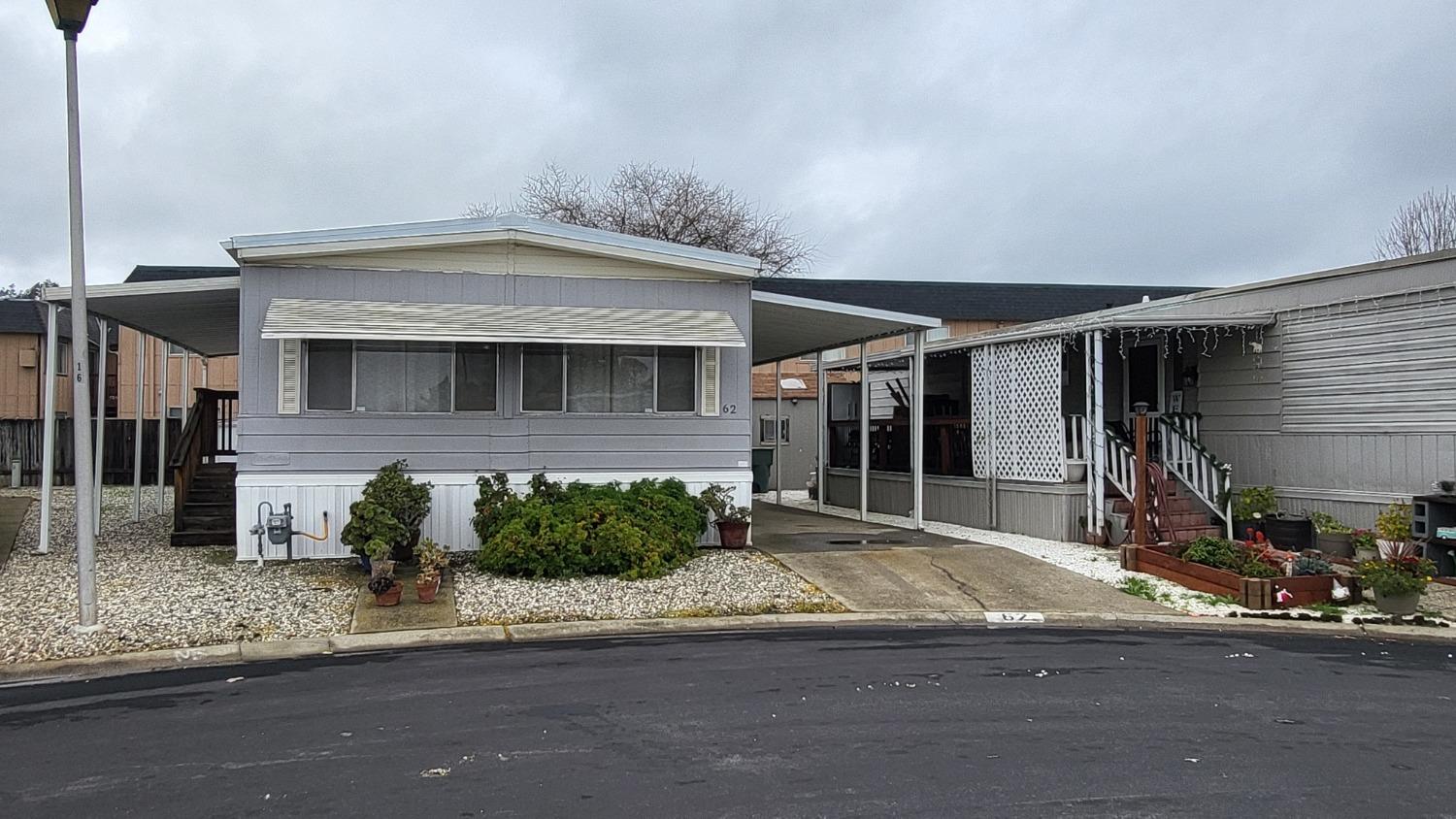 a front view of a house with garage