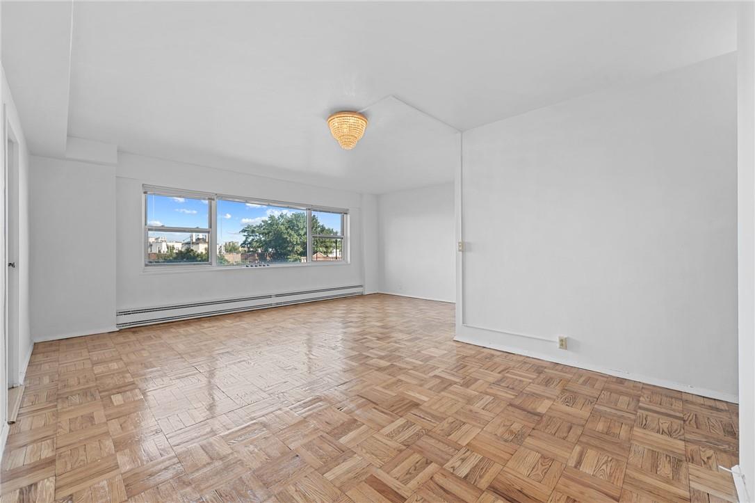 a view of an empty room and window