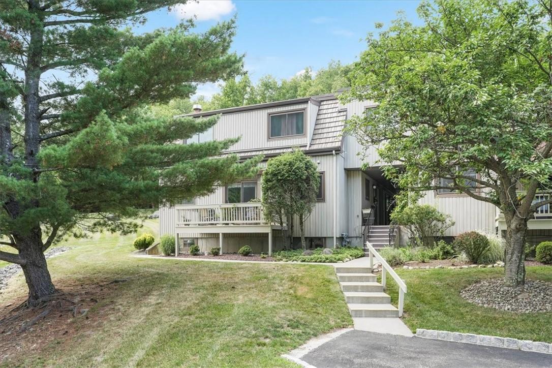 View of front of house with a front lawn