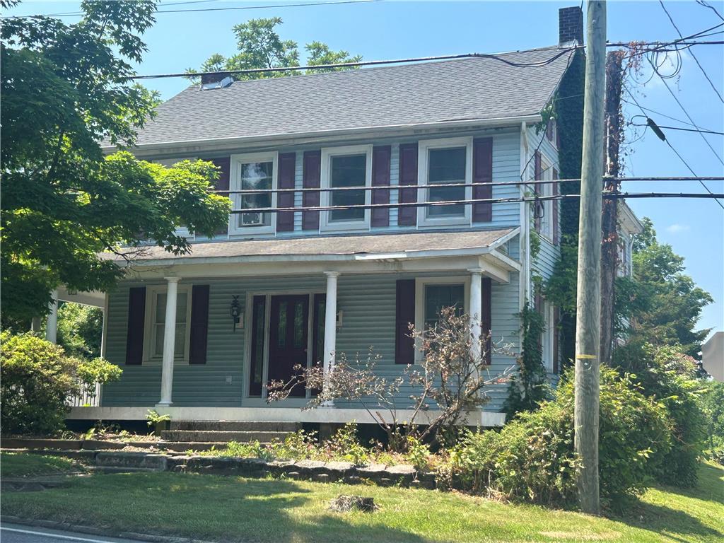 front view of house with a yard