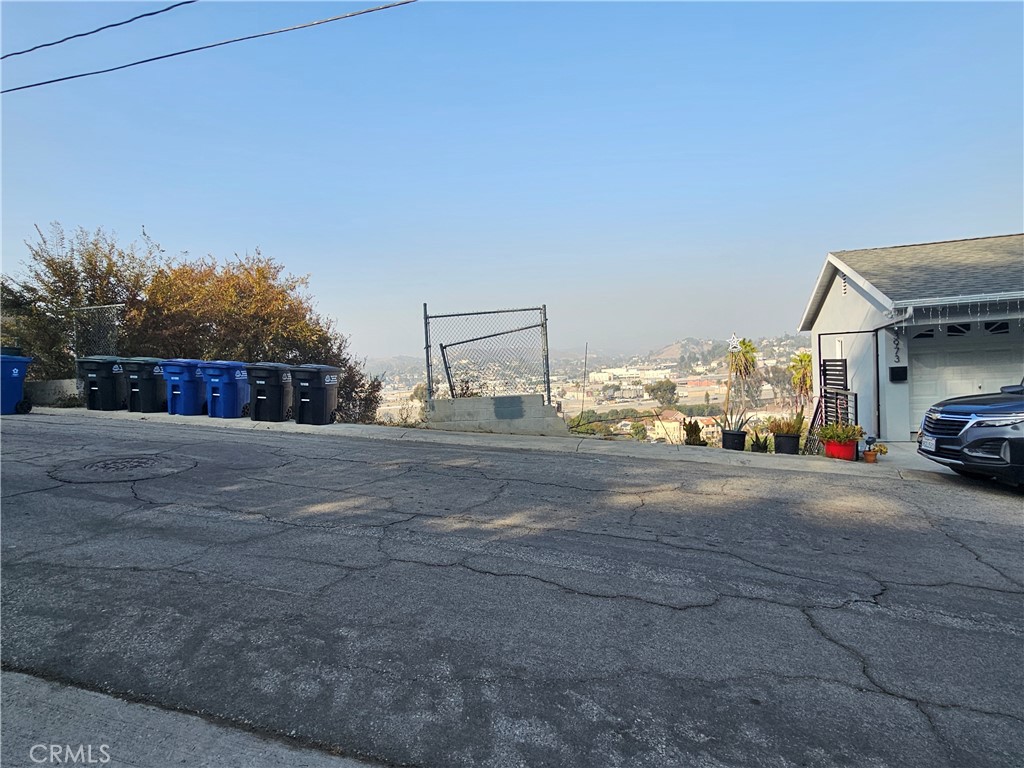 a view of street with cars