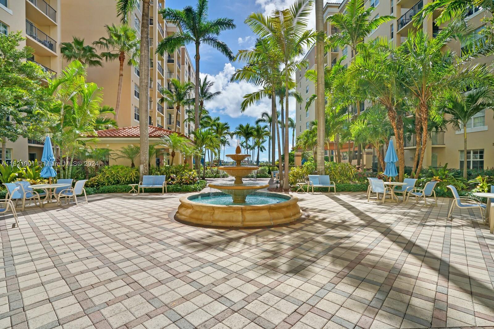 a swimming pool with outdoor seating and yard