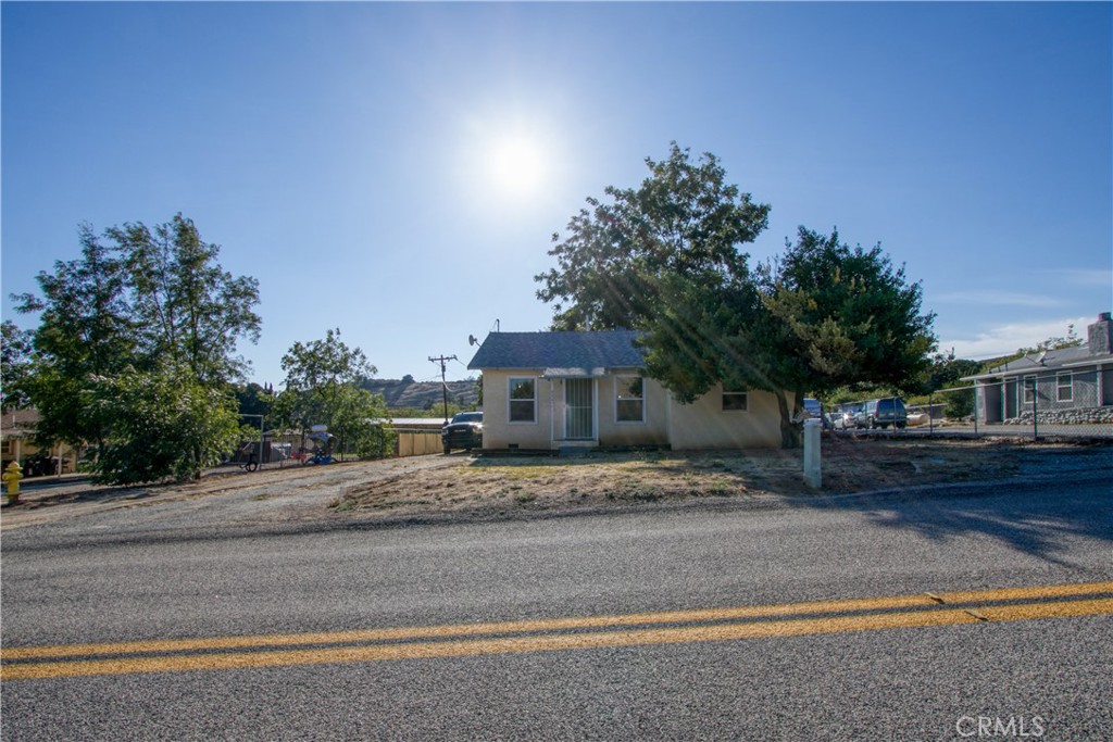 a house with a tree in the background