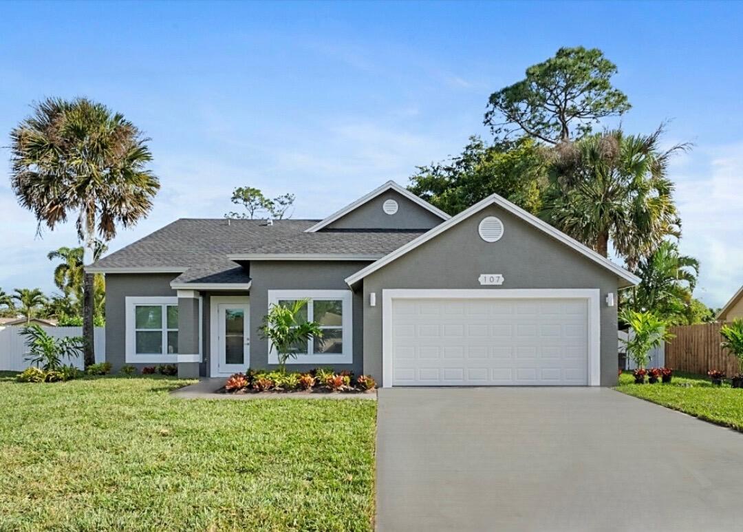 front view of a house with a yard